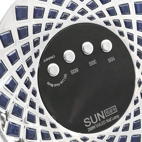 نمای کلوزآپ بالای دستگاه یو وی ال ای دی ناخن SUN YC-57B، نمایش دکمهها، صفحه نمایش LCD و پنجرههای کنار دکمهها