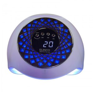 دستگاه یو وی ال ای دی ناخن SUN YC-57B از نمای بالا، روشن با تابش نور UV، نمایش صفحه LCD، تایمر و پنجرههای جانبی با نور ملایم آبی