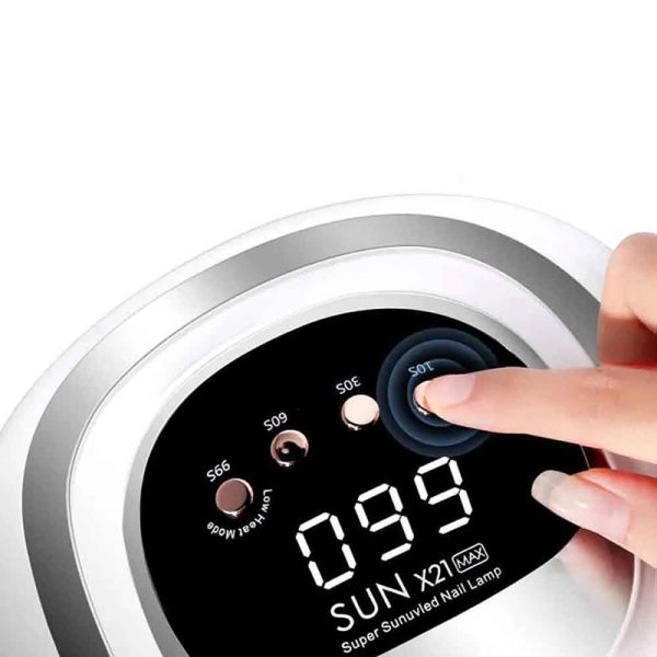نمای نزدیک دکمهها و صفحه نمایش دیجیتال دستگاه یو وی ال ای دی SUN X21 MAX با فعال شدن تایمر 99 ثانیه